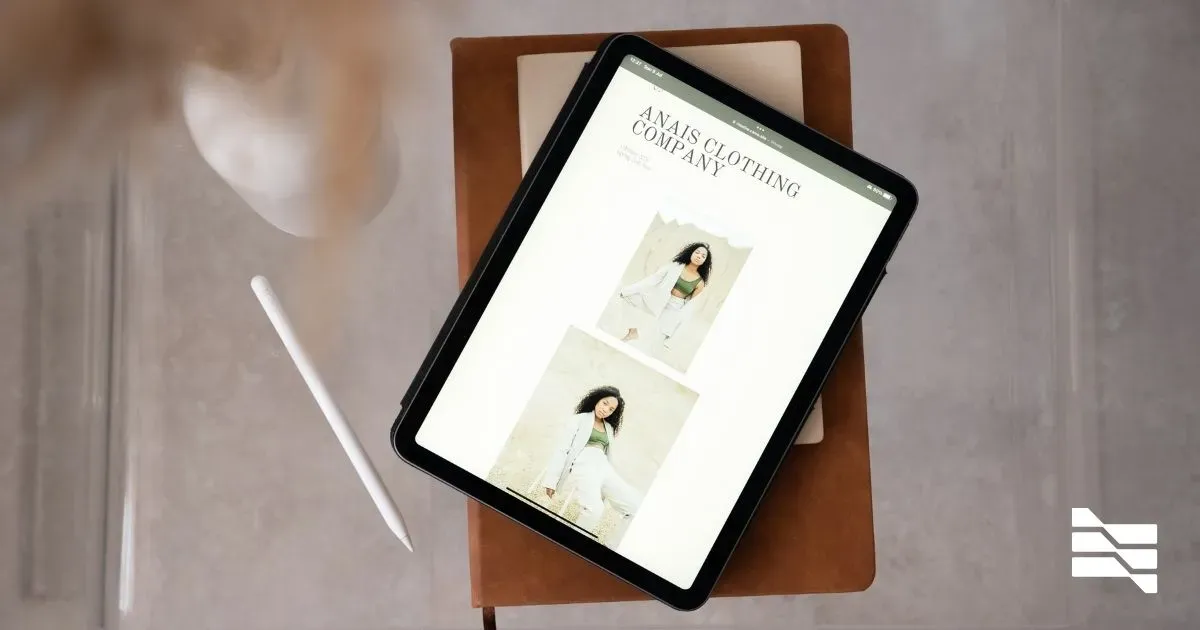 An iPad displaying a fashion website with images of a model, next to a stylus, depicting time management tools for freelancers in the fashion industry.