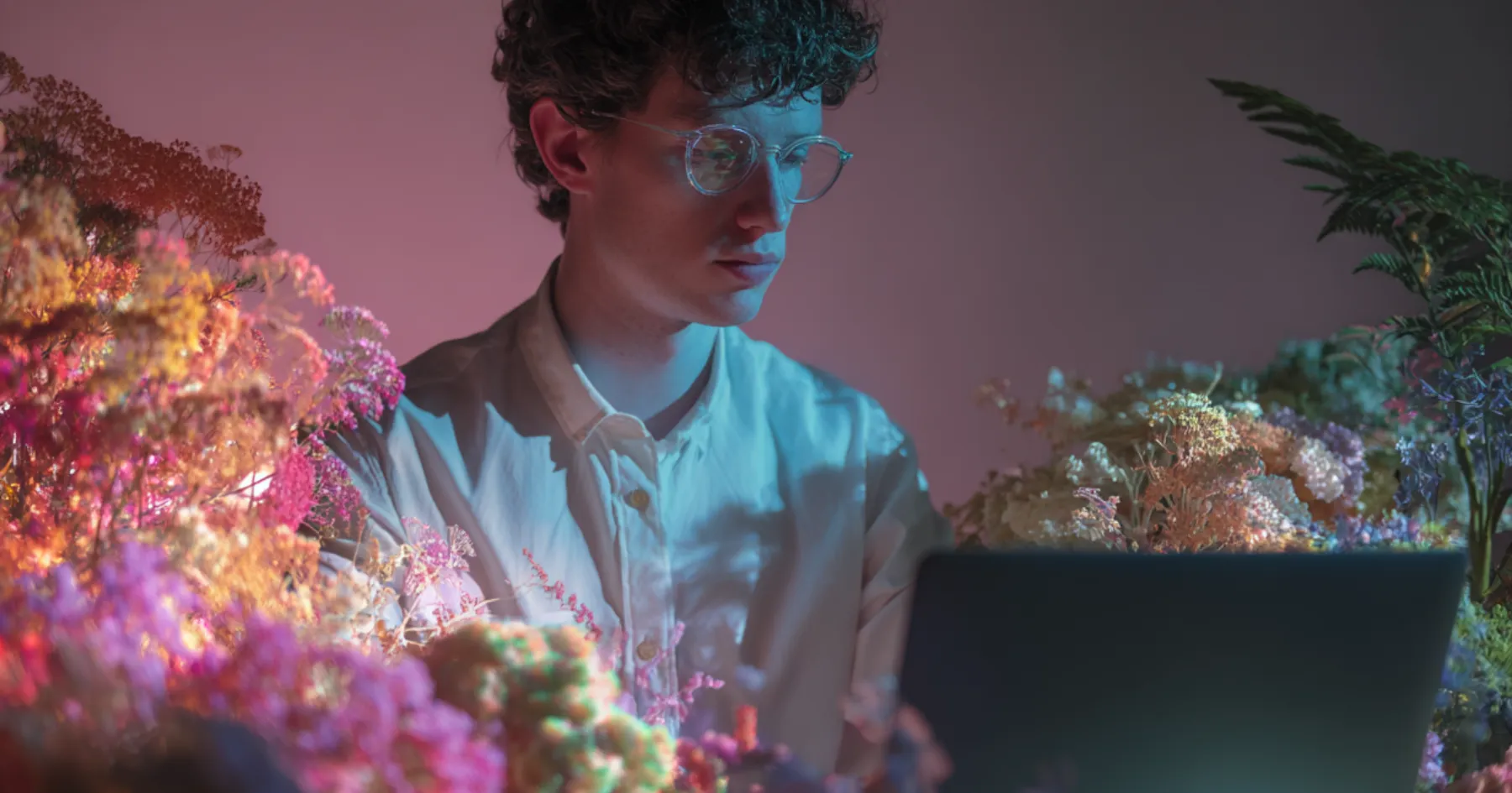 Student working on freelance projects from a laptop